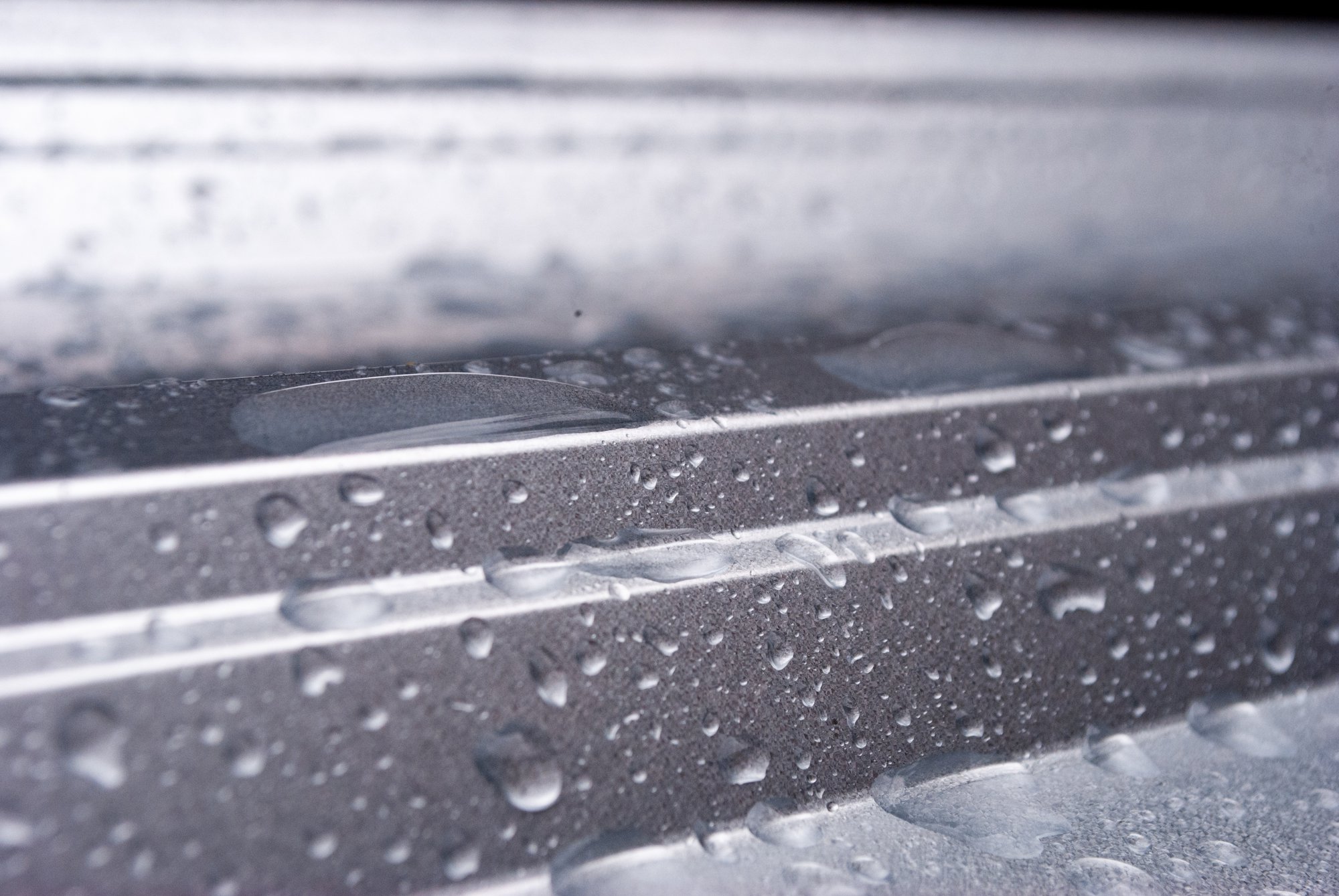 This photo shows active condensation on metal surfaces, a primary cause of the floor rust and corrosion commonly found around CRAC units in data centers.