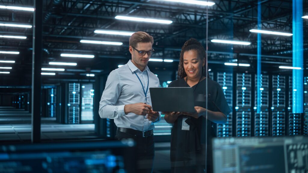 This photo shows Tenants discussing responsibilities in cleaning a hybrid data center.